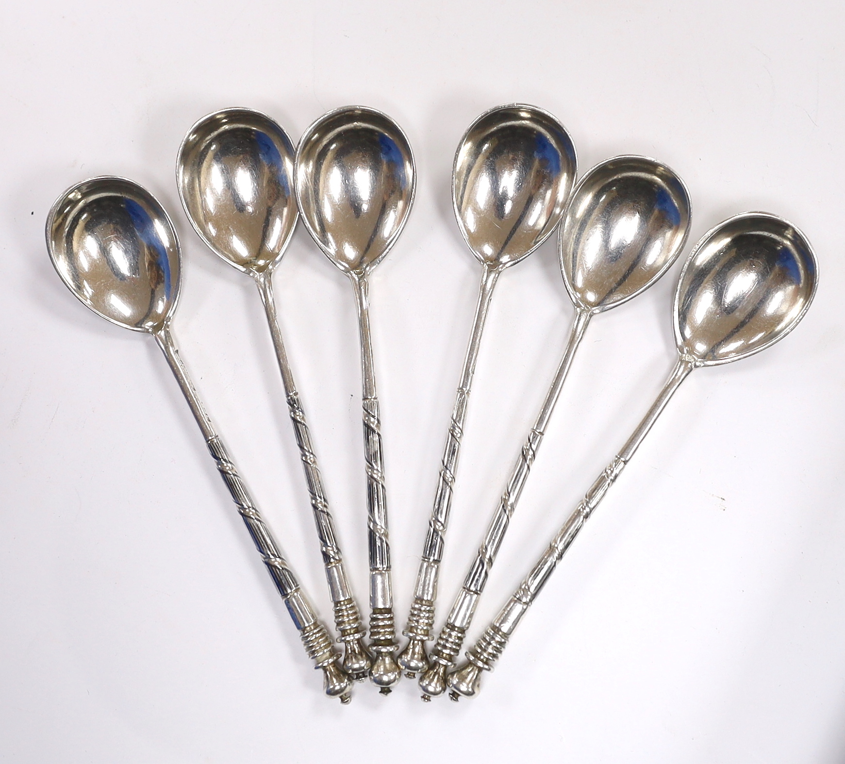 A set of six late 19th century Russian 84 zolotnik and niello teaspoons, the bowl backs decorated with building landmarks, master, Anatoly Artsibashov, 10.7cm, gross weight 82 grams.